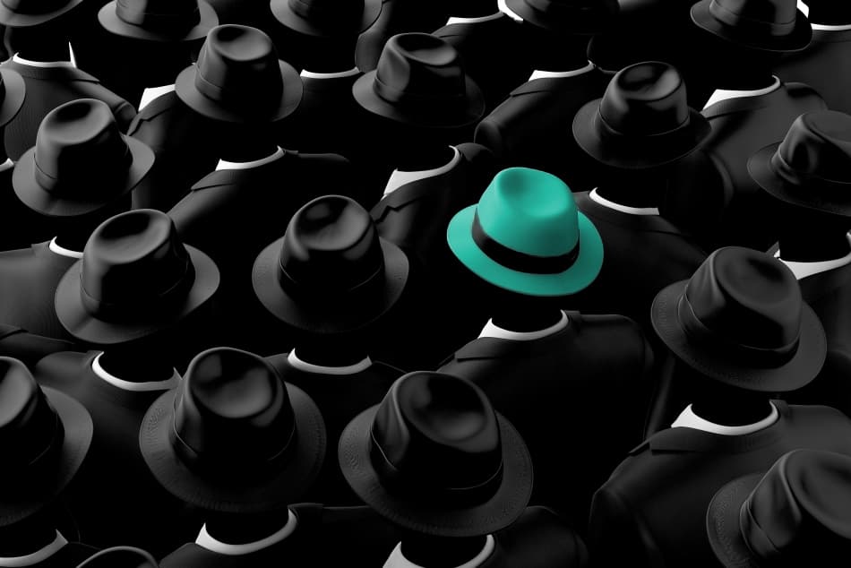 A teal-hatted candidate standing out in a crowd